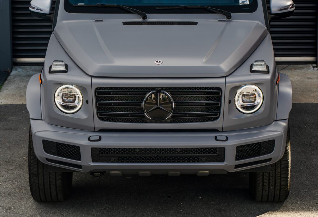 A Mercedes G55o with custom color change Wrap parked at the entrance to SS Customs, the oldest 5-star vehicle enhancement studio in Silicon Valley